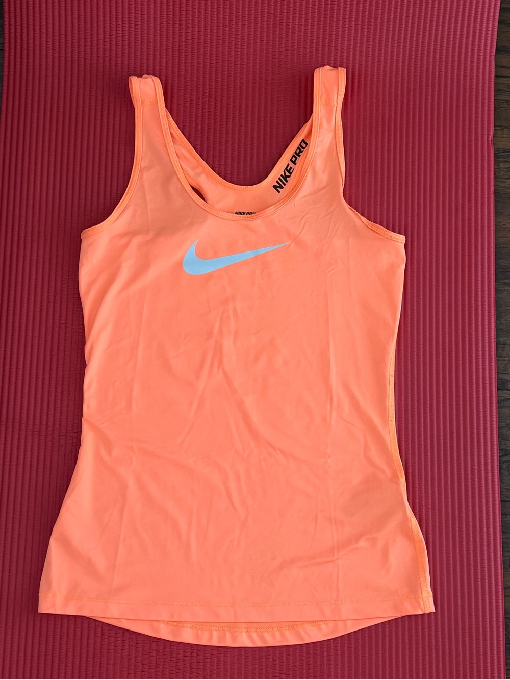 Nike Women’s Orange Tank Top with Light Blue Swoosh